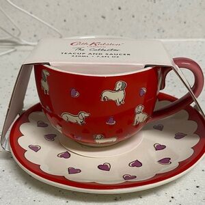 NWT.  Cath Kidston, 2 piece, stoneware, “Doxie”,  teacup/saucer set.